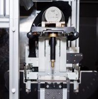 i) X-ray tube mounted on rotating gantry with collimator attached X-ray tube mounted on rotating gantry with collimator attached